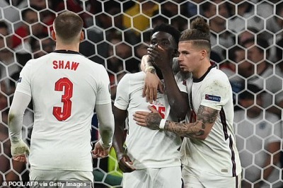 England players console Bukayo Saka after his penalty miss led to their defeat in the final